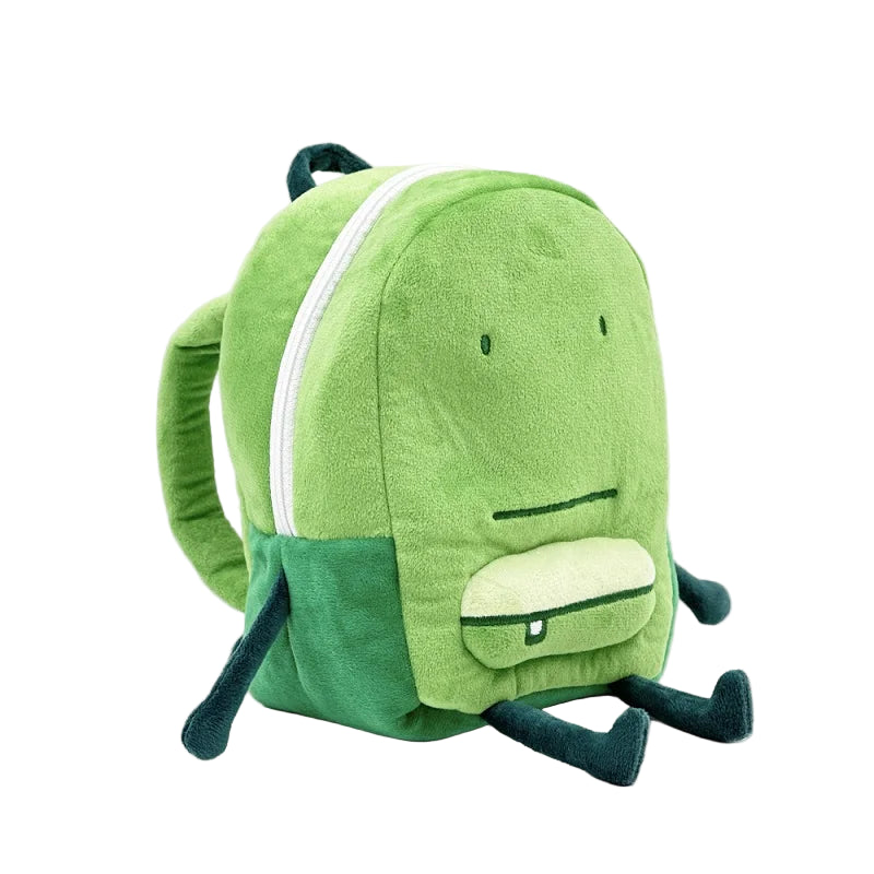 Green plush backpack with frog design on a white background