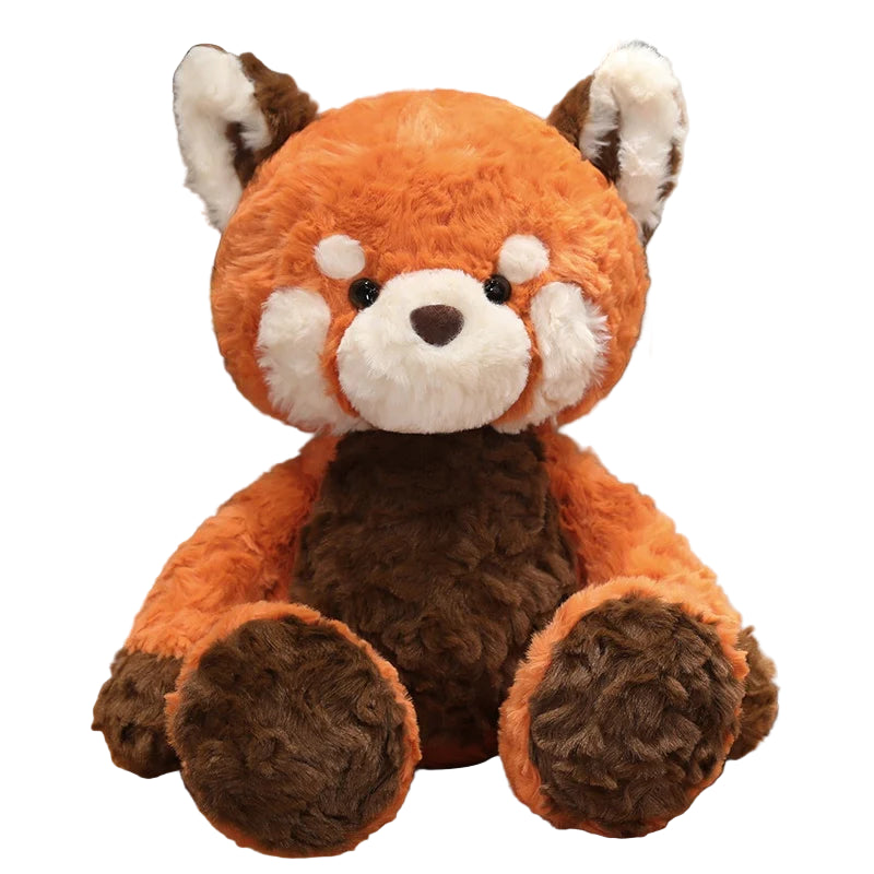 Plush toy red panda on a wooden surface with a blurred background